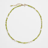 Beaded handmade necklace with peridot, freshwater pearls and green jade.