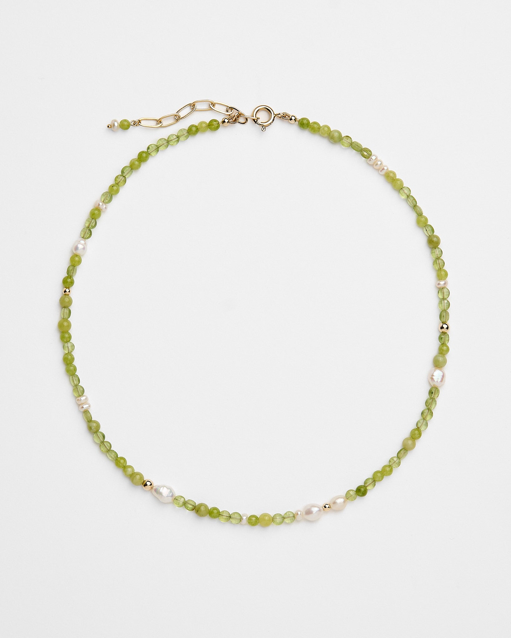 Beaded handmade necklace with peridot, freshwater pearls and green jade.