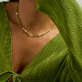 Beaded handmade necklace with peridot, freshwater pearls and green jade.
