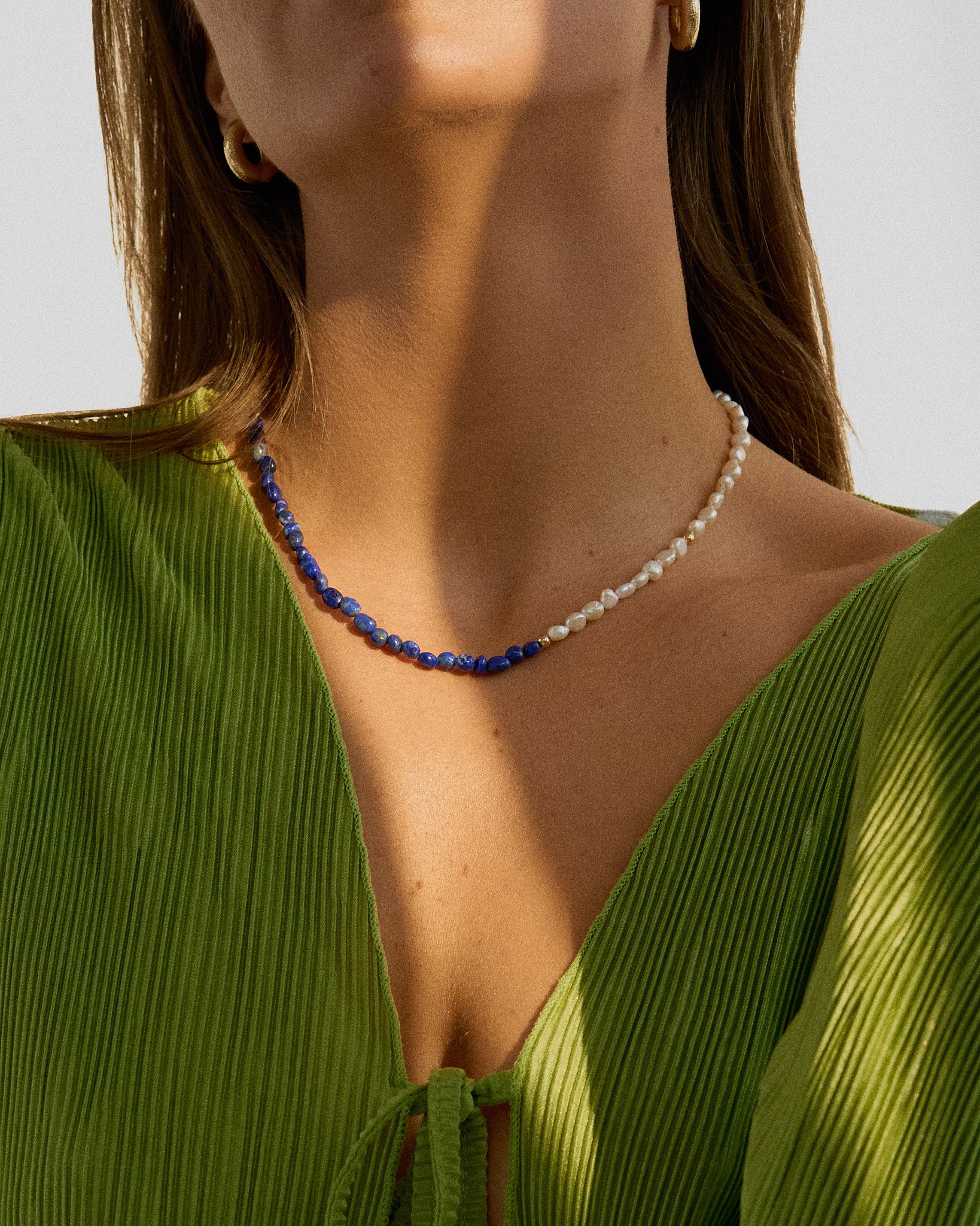 Beautiful deep blue beaded necklace with lapis lazuli and freshwater pearls